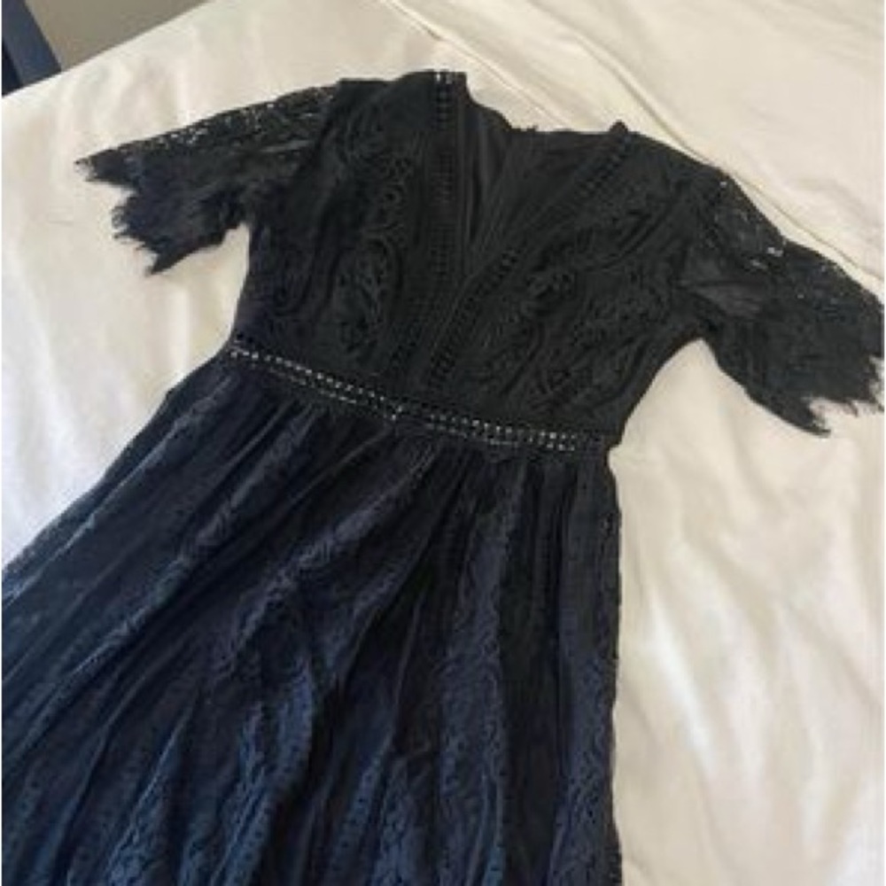Women’s long lace black dress. V front cut.